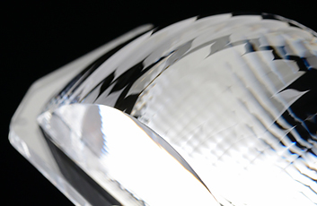 Headlamp lens (Automobile) / Asymmetrical lens